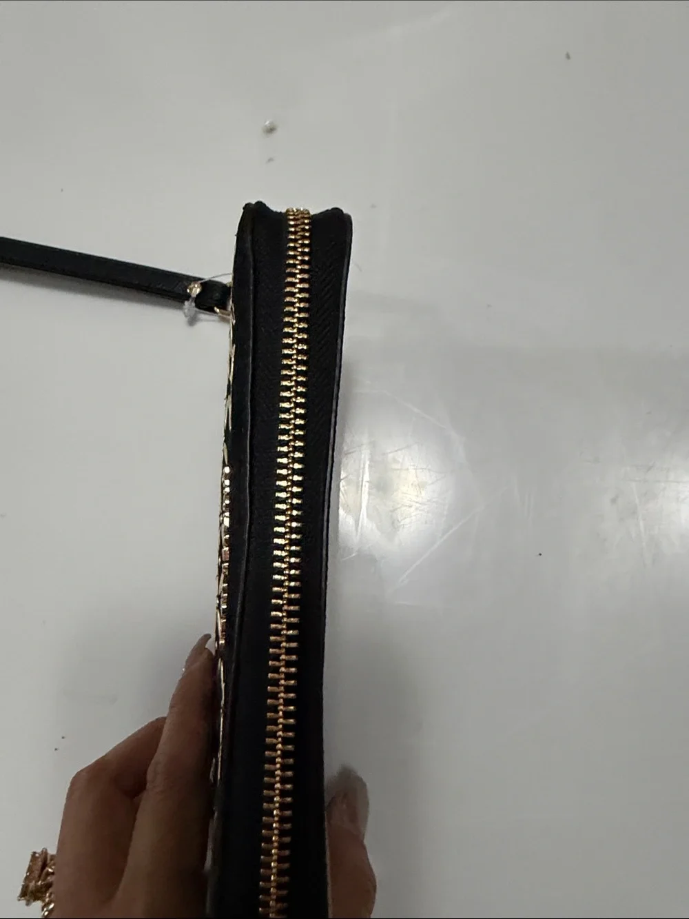Michael Kors Black Wristlet with Gold Stud Pattern